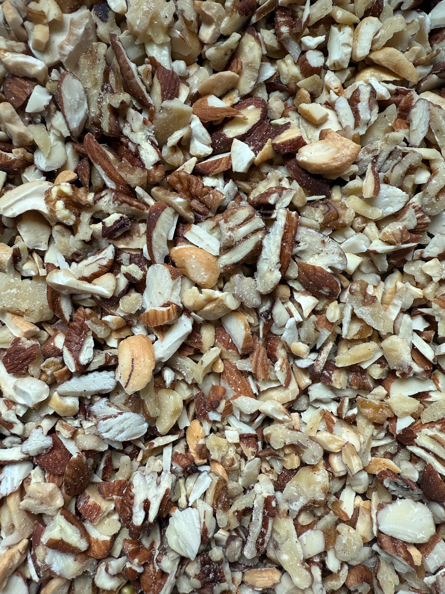 Coarse-sized chopped mixed nuts parrot treat blend from Eclectus Ark Close Up