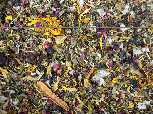 Natural flowers and herbs blend food topper for parrots and companion birds used to enhance chop pellets sprouts and seed mixes Close Up