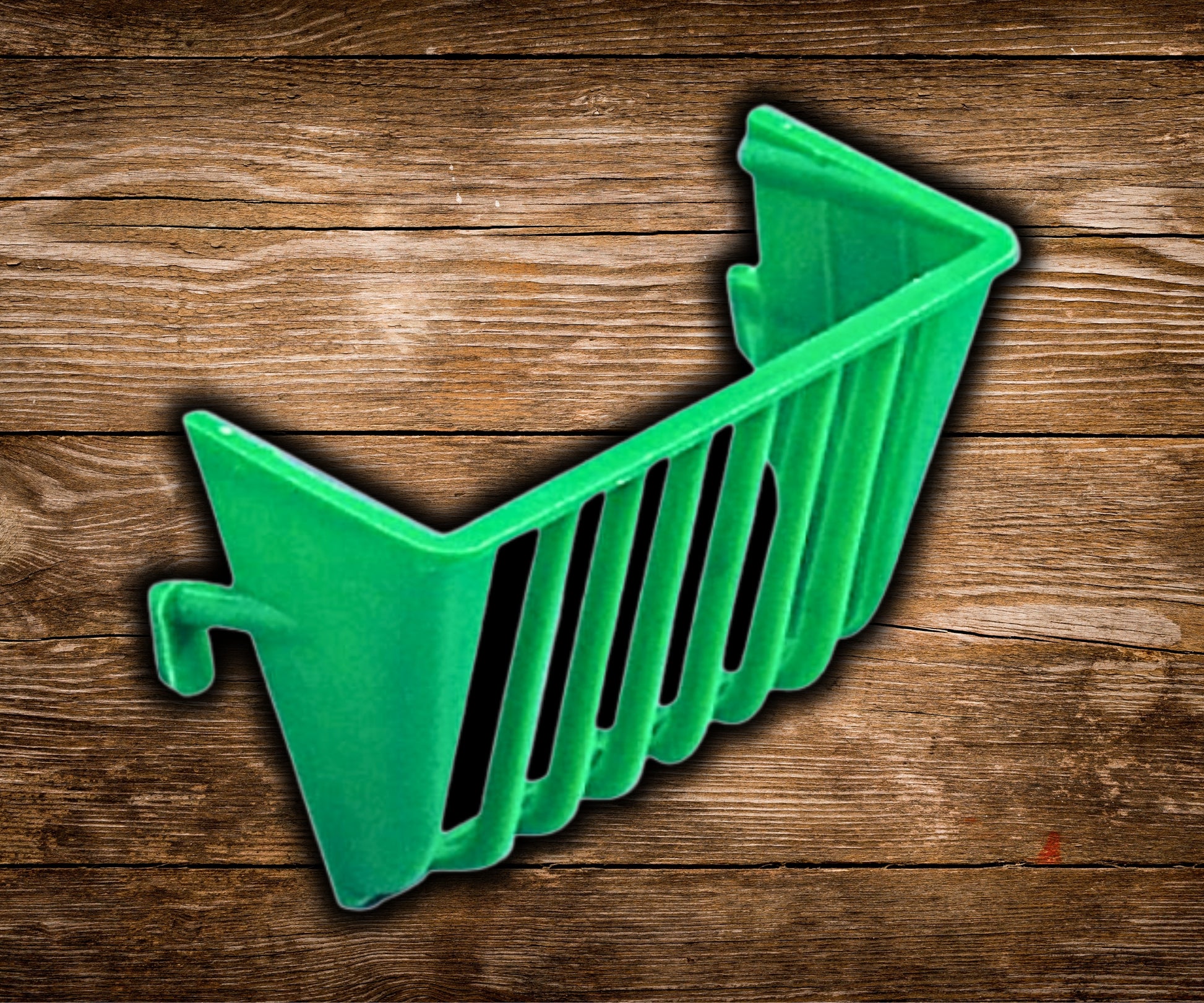 Plastic bird salad and nesting material holder in mixed colors (green, yellow, white) for canaries and finches, attaches inside or outside the cage.