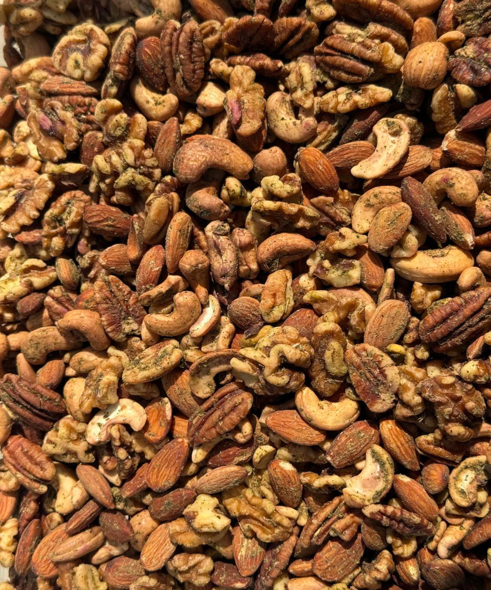 Close up picture of our Italian Super Greens Infused Whole Mixed Nuts